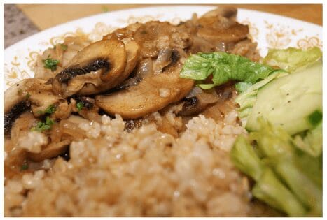 Sauteed mushrooms and brown rice with salad