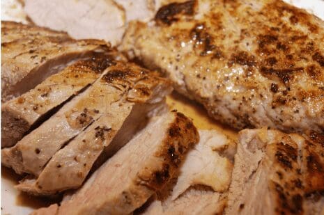 Sliced grilled pork loin with seared crust