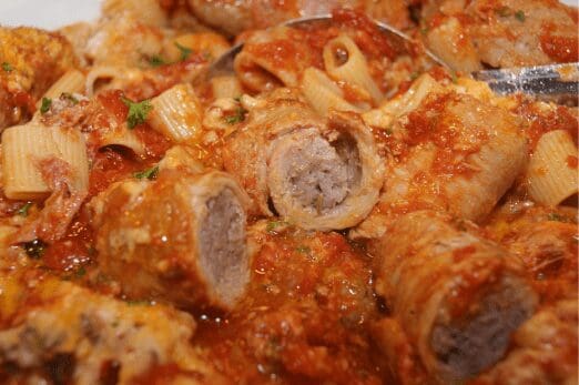Stuffed sausage pasta in rich tomato sauce