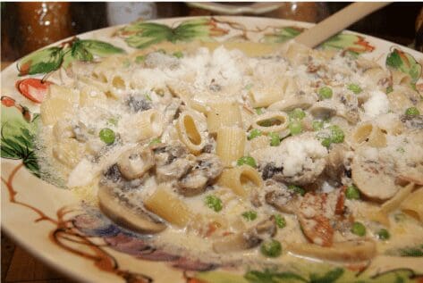 Creamy rigatoni with mushrooms, peas, and parmesan
