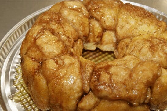 Glazed cinnamon monkey bread bundt on plate