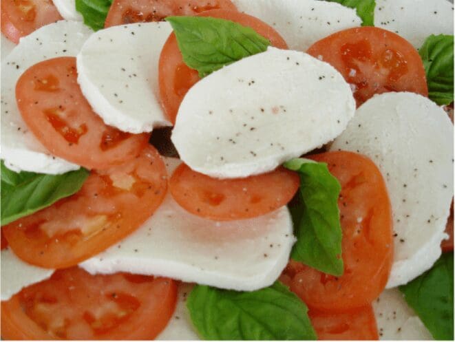 Tomato, mozzarella, and basil salad close-up.